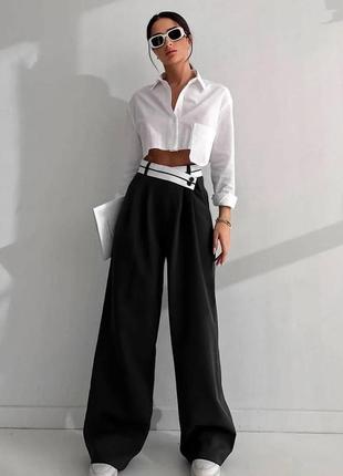 Стильные женские брюки палаццо с широкими штанинами черного цвета классические штаны на высокой посадке9 фото