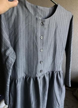 Сукня сірого кольору з натуральної тканини1 фото