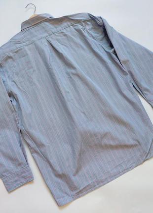Мужская рубашка в полоску и карманом от бренда dino4 фото
