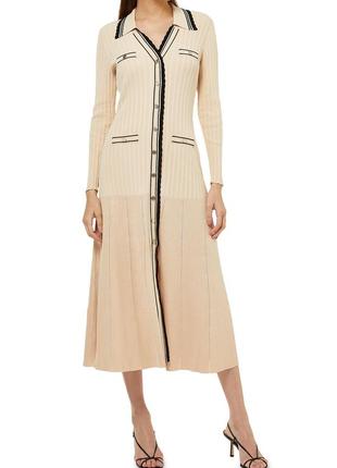 Бежева світла персикова трикотажна довга сукня клеш з довгим рукавом sandro