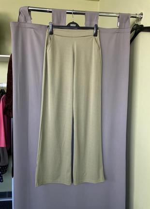 Стильні брюки - палаццо фісашкового кольору