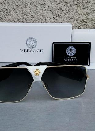 Окуляри в стилі versace унісекс сонцезахисні  сірі в золотій оправі1 фото