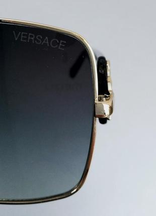 Окуляри в стилі versace унісекс сонцезахисні  сірі в золотій оправі10 фото