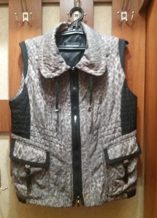 Жилет утеплений