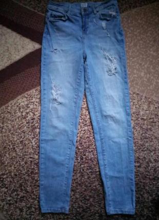 Рваные джинсы р.м