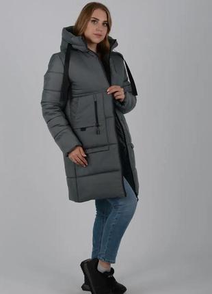 Жіноча зимова куртка пуховик з накладними кишенями та капюшоном4 фото