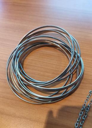 Круглые браслеты серебряные металические много тонких браслетов3 фото