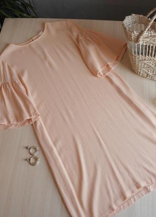Блузка персикова з воланами об'ємними рукавами туніка помаранчева2 фото