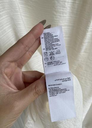 Блуза молочного цвета с рефленным воротником6 фото