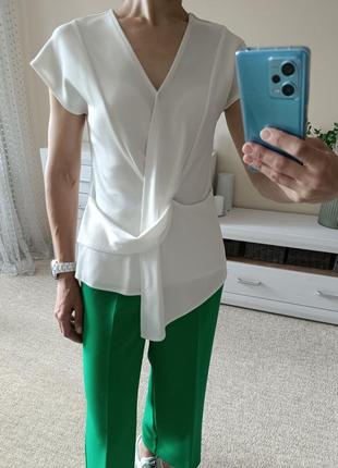 Более красивая оригинальная трикотажная блуза молочного цвета3 фото