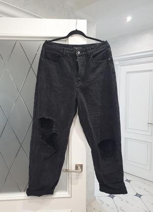 Стильные рванные джинсы1 фото