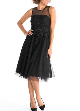 Эффектное черное вечернее платье  из фатина — актуальный модный тренд1 фото