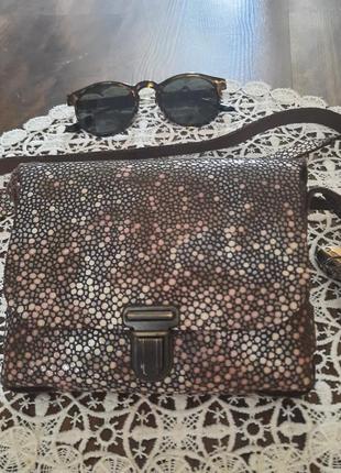Оригинальная брендовая кожаная сумочка с лазерным напылением napsoe2 фото