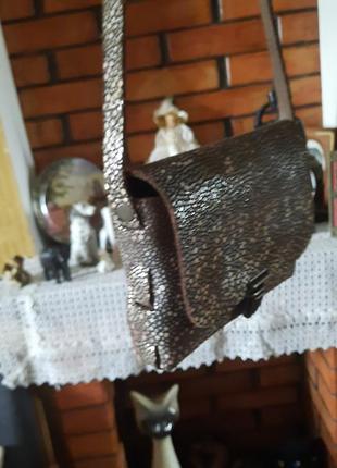 Оригинальная брендовая кожаная сумочка с лазерным напылением napsoe9 фото