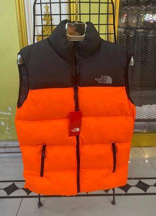 Мужская оранжевая стёганая жилетка безрукавка the north face помаранчева стьобана жилетка the north face