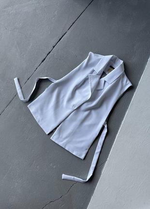 Білий жилет піджак з розрізами5 фото