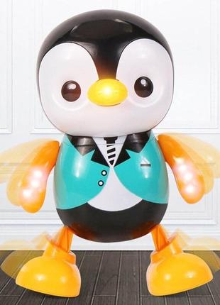 Пінгвін танцює музична іграшка зі світлом на батарейках 171784 фото