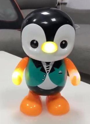 Пінгвін танцює музична іграшка зі світлом на батарейках 171783 фото