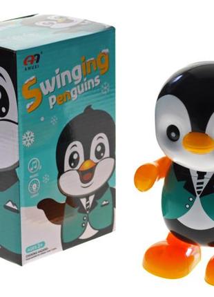 Пінгвін танцює музична іграшка зі світлом на батарейках 171782 фото