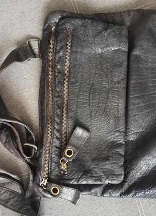 Шкіряна  з довгою ручкою дуже вмістка