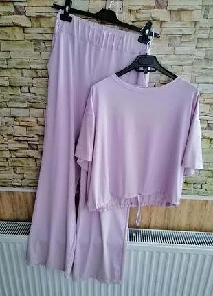 Прогулочный костюм в рубчик нежно-лилового цвета футболка оверсайз на завязке длинные широкие брюки