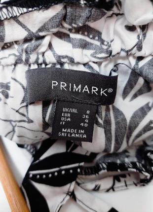 Жіноча чорно біла з принтом блуза на бретелях з відкритими плечами внизу з рюшами, від бренду primark5 фото