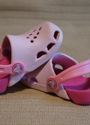 Фирменные босоножки-сабо розового цвета crocs c 5 ( 22 р.).1 фото