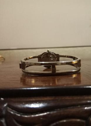 Женские часы на браслете.3 фото