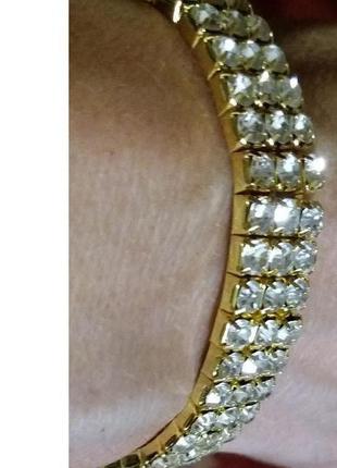 Женский браслет на резинке золотистая основа бриллианты имитация бижутерия5 фото