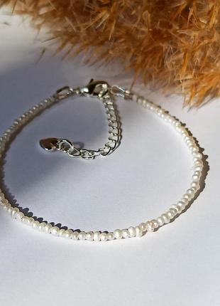 Браслет натуральный жемчуг на застежке d-2.2мм обхват 18см