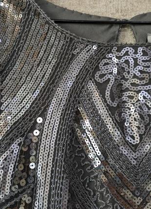 Срібляста сукня в пайетки