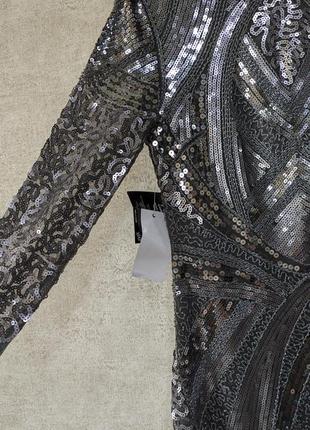 Срібляста сукня в пайетки