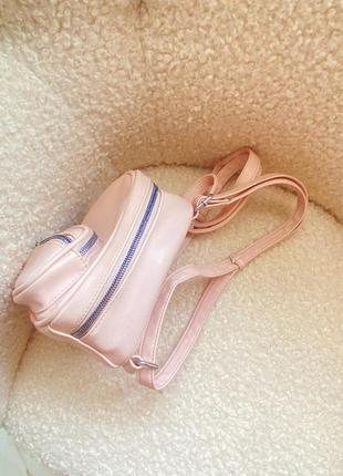 Маленький рожевий рюкзак.1 фото