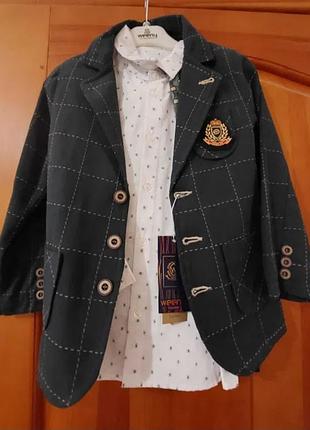 Костюм на мальчика 120-122. пиджак, рубашка, галстук и брюки.