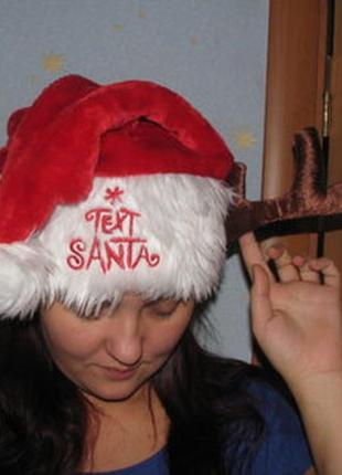 Карнавальна шапка санта клаус.