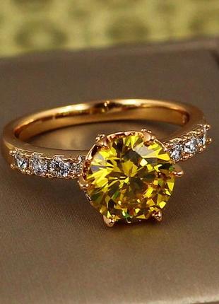 Кольцо  xuping jewelry зерно граната с желтым камнем р 18 золотистое