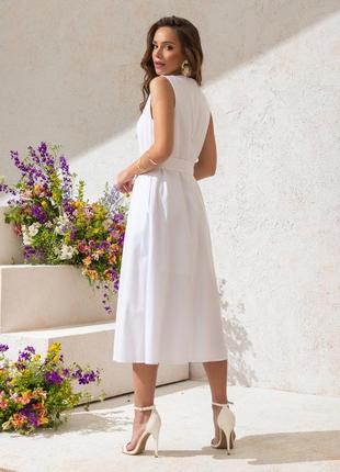 Элегантное платье без рукавов с узким треугольным вырезом2 фото