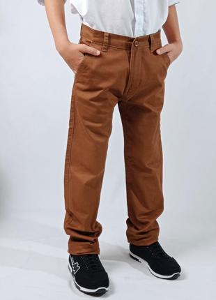 Штани для подростка мальчика котоновые темно горчичного цвета1 фото