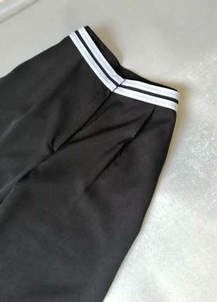 Стильний костюм з легкої струминної тканини топ корсет і довгі штани палаццо5 фото