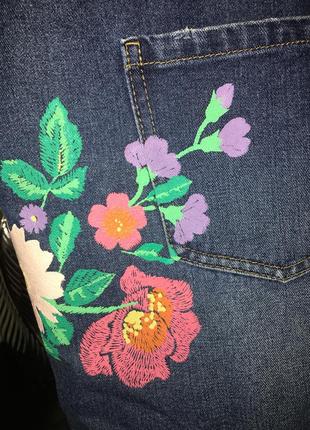 Сині джинсові шорти з квітами4 фото