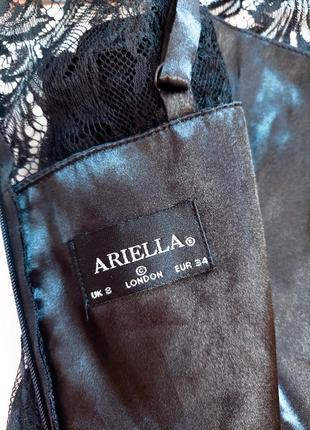 Жіноча вечірня чорна гіпюрова приталена сукня міді з мереживом від бренду ariella,