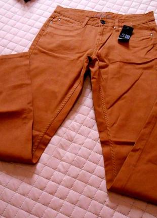 Стильные узкие  рыжие джинсы.7 фото