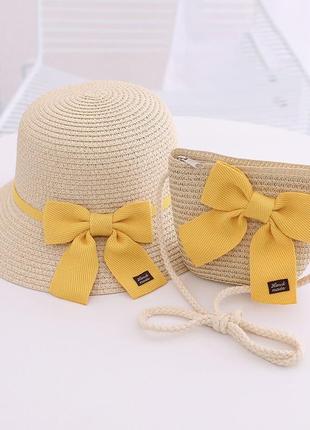 Комплект дитячий сонцезахисний солом'яний капелюх канотьє з рівними крисами та солом'яний сумочка колір кремовий