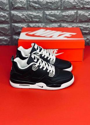 Nike кроссовки подростковые черные с белыми эмблемами 36-4010 фото