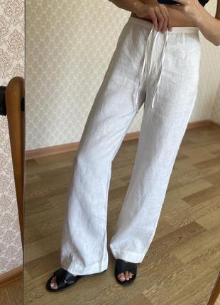 Белые льняные брюки палаццо