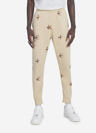 Nike nsw all-over print club fleece joggers3 фото