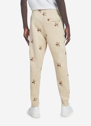 Nike nsw all-over print club fleece joggers2 фото