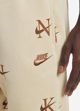 Nike nsw all-over print club fleece joggers4 фото