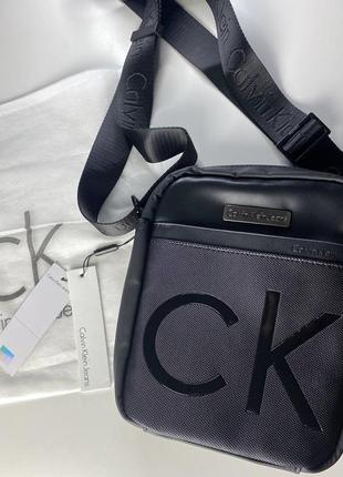 Мужская черная сумка месенджер calvin klein, ck1 фото