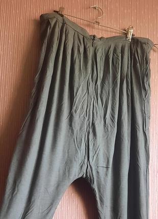 Стильные авангардные брюки смотной слоской низким шаговым швом в виде rundholz от дизайнеров mango7 фото